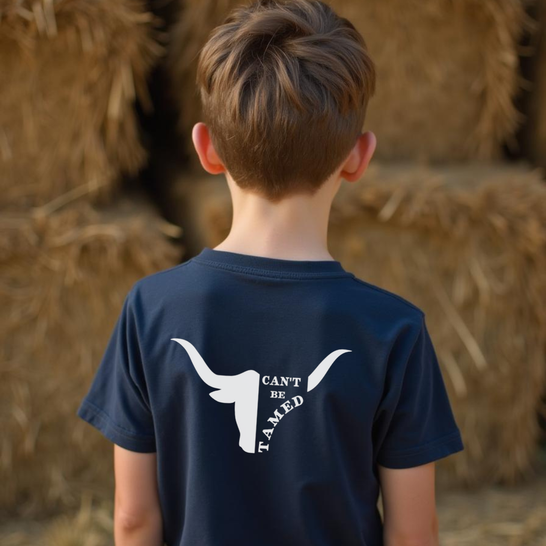 Back of young boy wearing Navy boys country western t-shirt with skull design by Sunburnt Country Clothing, Australian kids country clothing
