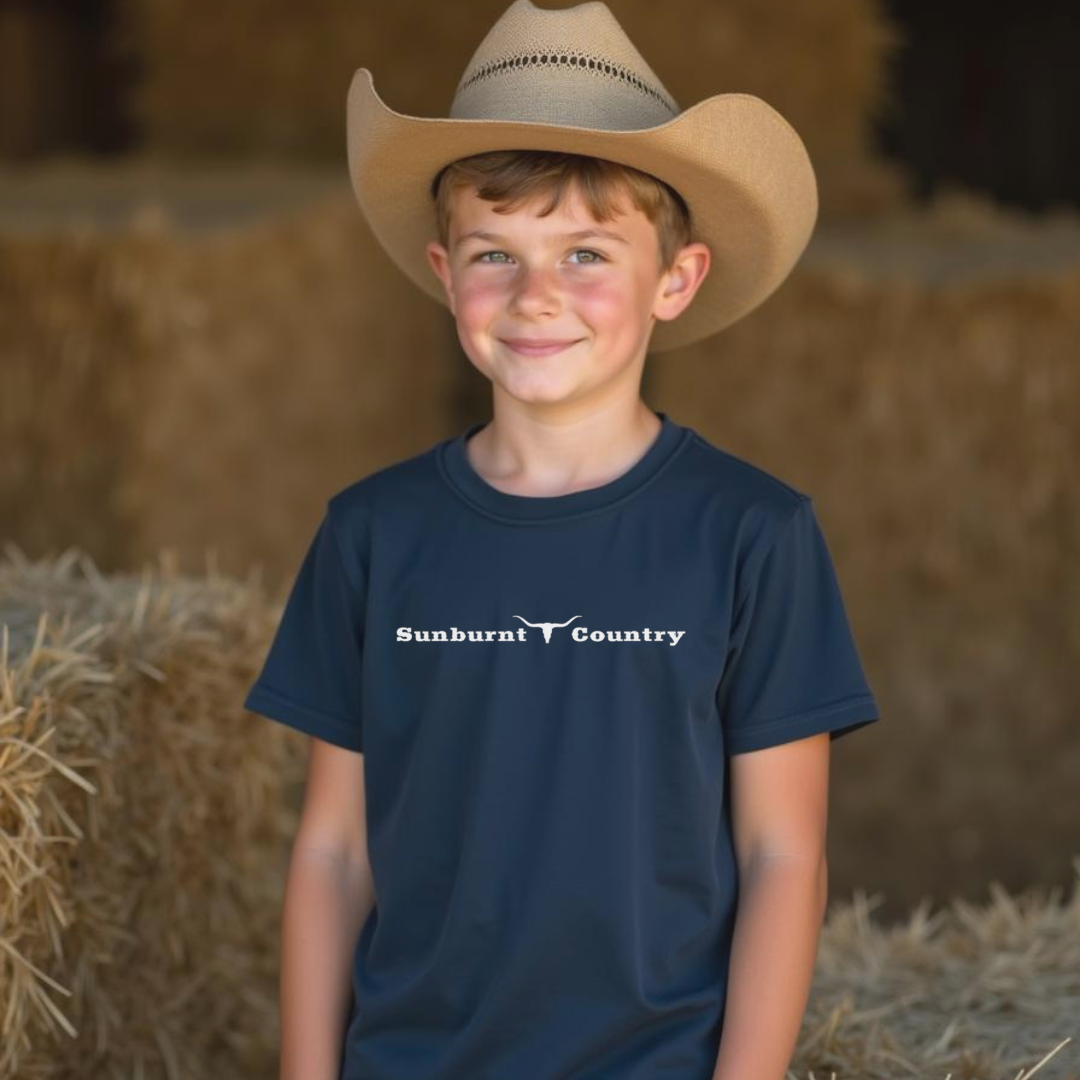 Front of young boy wearing Navy boys country western t-shirt with skull design by Sunburnt Country Clothing, Australian kids country clothing