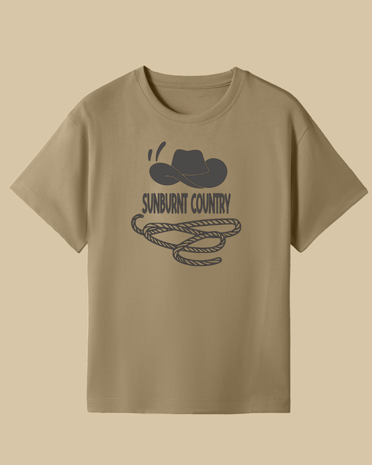 Front of a Stone coloured boys country western t-shirt with cowboy hat and lasso design by Sunburnt Country Clothing, Australian kids country clothing