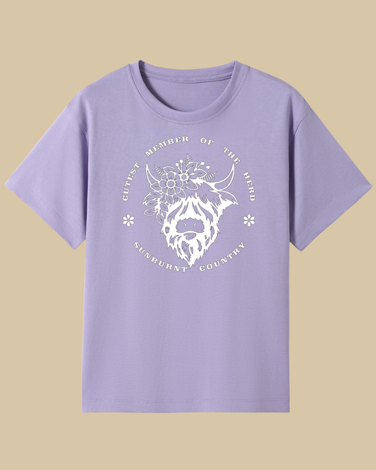 Front of a lilac coloured girls country western t-shirt highland cow design by Sunburnt Country Clothing, Australian kids country clothing