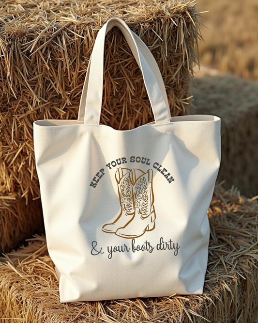 Sunburnt Country Clothing canvas tote bag with cowboy boot design and text on hay bales