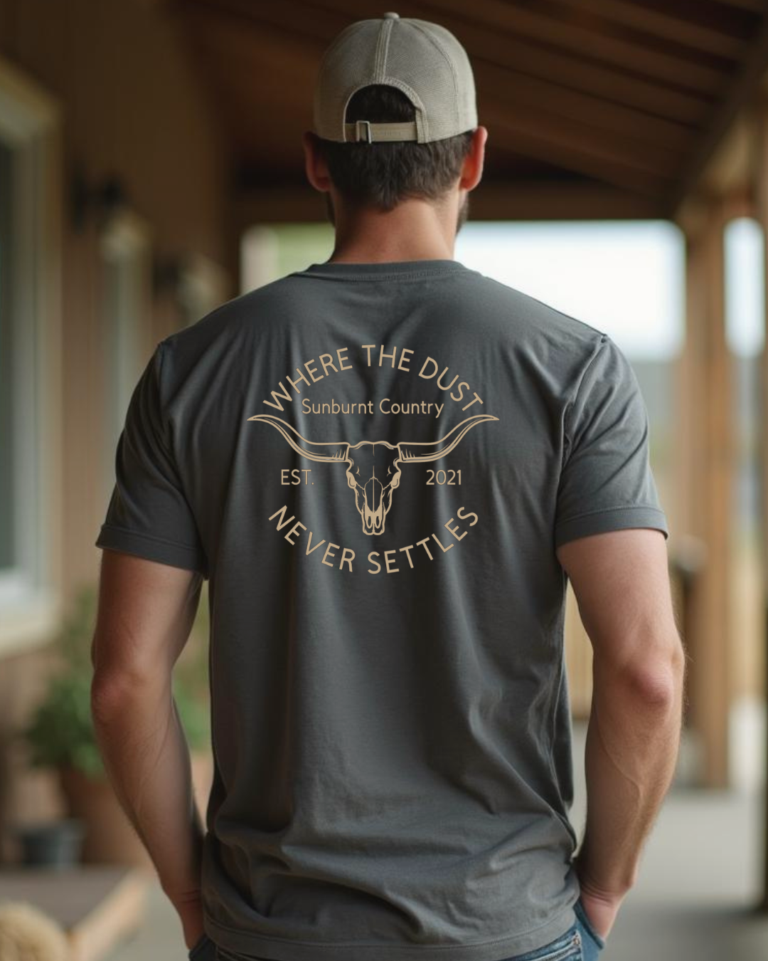 Male model wearing Sunburnt Country Clothing Heritage tee charcoal country t-shirt back print Australia